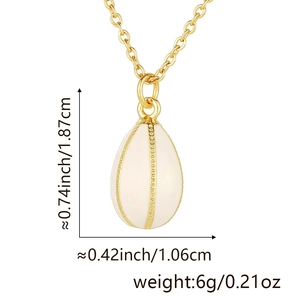 Macro detail of cream egg pendant showing 1.87cm height and 1.06cm width dimensions