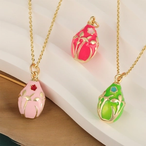 Vintage oval floral pendants with 18K gold plating in pink, magenta and green colors