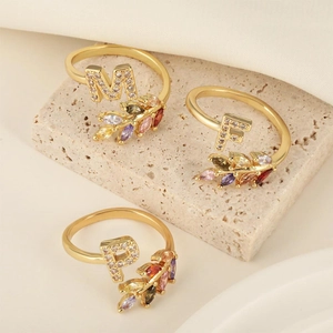 18k gold plated open ring featuring colorful marquise stones and micro-pave letter