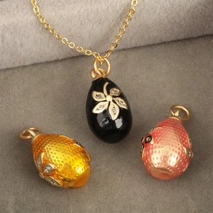 Exquisite 18k gold plated enamel egg pendant necklace with intricate floral pattern