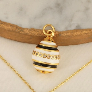 Faberge style egg pendant in black and white enamel with 18K gold plated copper chain