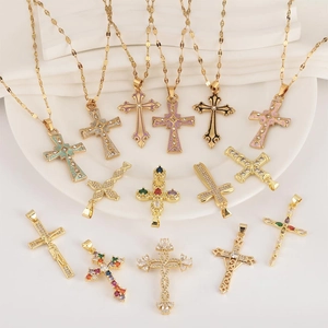 Assorted gold-plated cross pendants with colorful enamel and cubic zirconia stones