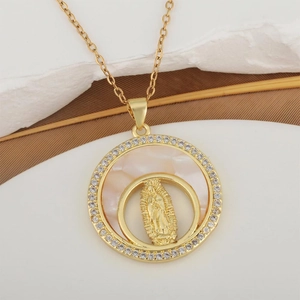 Vintage gold necklace with zircon-encrusted Virgin Mary pendant on mother of pearl disk