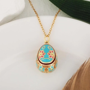 Faberge-style light blue enamel egg pendant necklace with pink floral and gold patterns