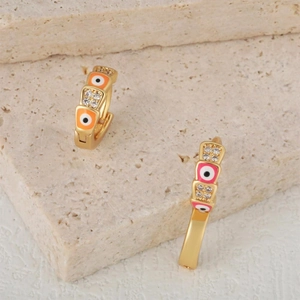Luxury gold huggie earrings with colorful enamel devil's eye and pavé zircon stones