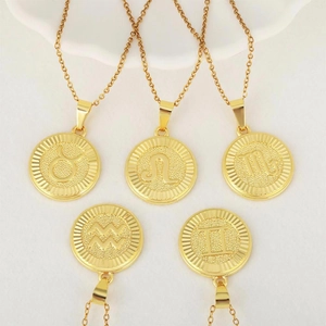 Colliers zodiaque plaqués or 18 carats avec pendentifs ronds minimalistes en relief
