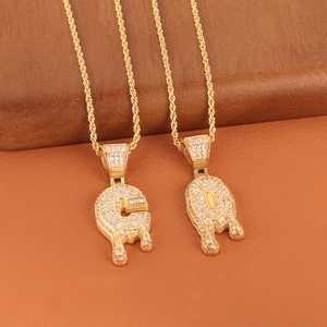 Hip hop style gold pendant necklaces with dripping G and Q letters and white zircons