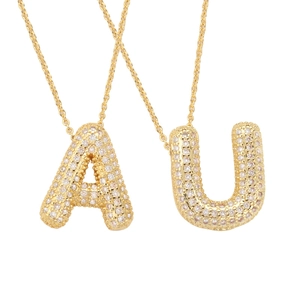 18k gold plated bubble initial necklace with micro-paved cubic zirconia letters A and U