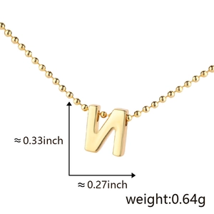 Detailed view of polished gold letter N pendant with precise size and weight measurements