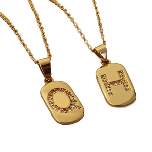 Gold-plated rectangular letter pendants with zircon stones on a simple cross chain