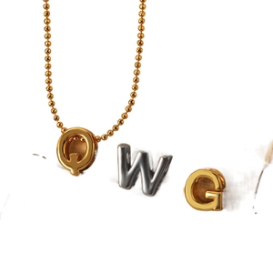 Polished gold and silver alphabet letter pendants on a stylish ball chain necklace