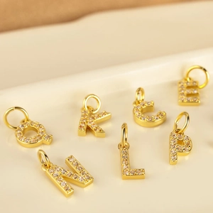 Gold plated alphabet letter pendants with cubic zirconia inlay for necklaces