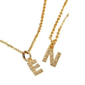 Minimalist gold plated copper necklaces with sparkling cubic zirconia letters E and N