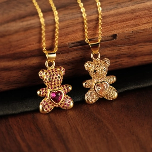 Colliers en or avec pendentifs ours, micro-pavage de zircons et pierres précieuses en cœur