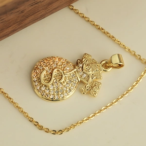 Goldene Geldbeutel-Halskette mit Zirkonia-Steinen und Dollarzeichen für Damen