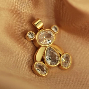 Sparkling teddy bear pendant with micro-inlaid cubic zirconia in polished gold finish