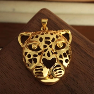 Golden hollow leopard head pendant necklace with intricate hip hop street style carvings