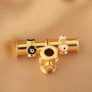 Golden cylinder evil eye beads for DIY jewelry bracelets with polished finish