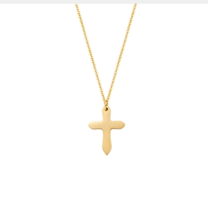 Detail of a gold-plated cross pendant necklace featuring matte finish and fine link chain