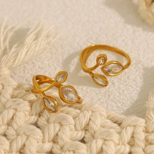 Leaf-shaped 18K gold plated stainless steel open rings with marquise zircon stones