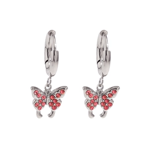 Detailed macro view of silver hoop earrings featuring pink rhinestone butterfly charms