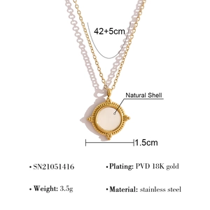 Detail view of 18K gold plated stainless steel necklace with 1.5cm shell pendant