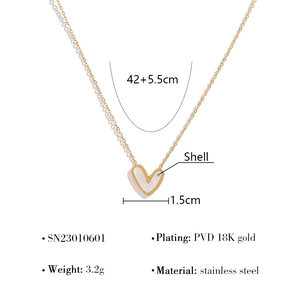 Detail showing 18K gold-plated stainless steel necklace with white shell heart pendant