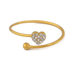 Detailed shot of open gold heart bracelet featuring micro-pave cubic zirconia stones