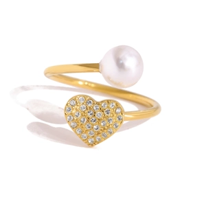 Detailed close-up of 18K gold-plated bypass ring with round pearl and zircon heart