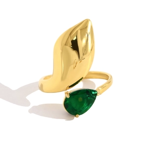 Irregular gold open ring with teardrop emerald zircon in a minimalist vintage style