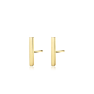 Macro detail of minimalist gold-plated rectangular bar stud earrings with a polished finish