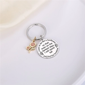 Sunflower stainless steel keychain with engraved round pendant and golden enamel flower charm