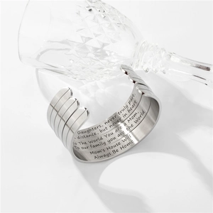 Polished silver C-shaped cuff bracelet with emotional Mother's Day engraving inside