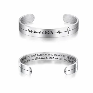 Minimalist 10mm C-shaped silver mom bracelet with laser-engraved bird and heart details