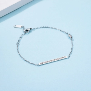 Elegant silver-tone stainless steel bar bracelet with inlaid zircon stones and cloud charm