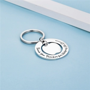 Teacher appreciation keychain with apple charm and Thank You for Helping Me Bloom text