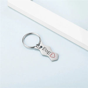 Portachiavi puzzle in acciaio inossidabile lucido con incisione MOM e cuore rosso su blu
