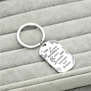 Stainless steel mother daughter keychain with engraved floral pattern and sentimental text