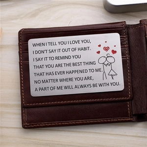 Titanium wallet card with love message and stick figure icons inside a leather wallet