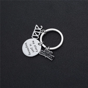 Silver stainless steel graduation keychain with 2020 charm and motivational engraving