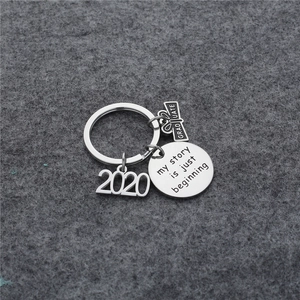 Polished 2020 graduation keychain with graduate scroll and my story is just beginning disk