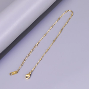 Elegante tobillera de cadena con cuentas en oro rosa de 18K y cierre de mosquetón ajustable