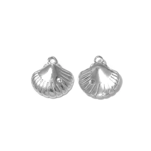 Detailed view of silver scallop shell charms with polished finish for DIY jewelry