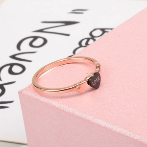 Rose gold titanium steel ring with black Love heart and zircon accent for women