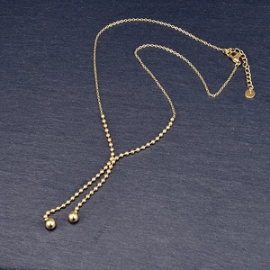 Elegante 18K vergoldete Edelstahl Y-Halskette mit goldenen Perlenanhängern als Quaste