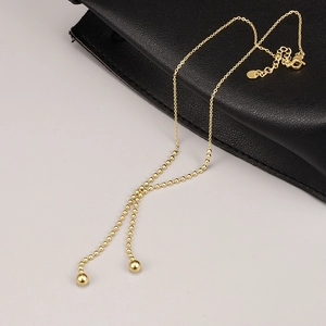 Elegante 18K vergoldete Edelstahl Y-Halskette mit doppelten Kugel-Quasten-Anhängern