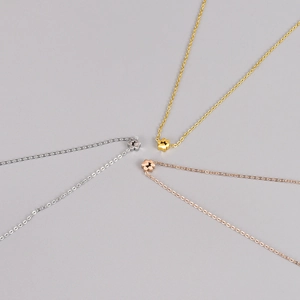 Polished stainless steel necklaces with hollow flower pendants in silver, gold and rose gold