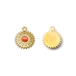 Golden sunburst charms with orange gemstones and metal dot texture for DIY jewelry