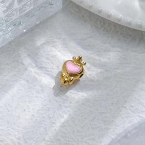 Pink heart pendant with gold crown and bow design for DIY jewelry making and bracelets