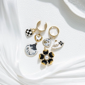 Retro stainless steel jewelry set with enamel flower, heart, and handbag charms for DIY